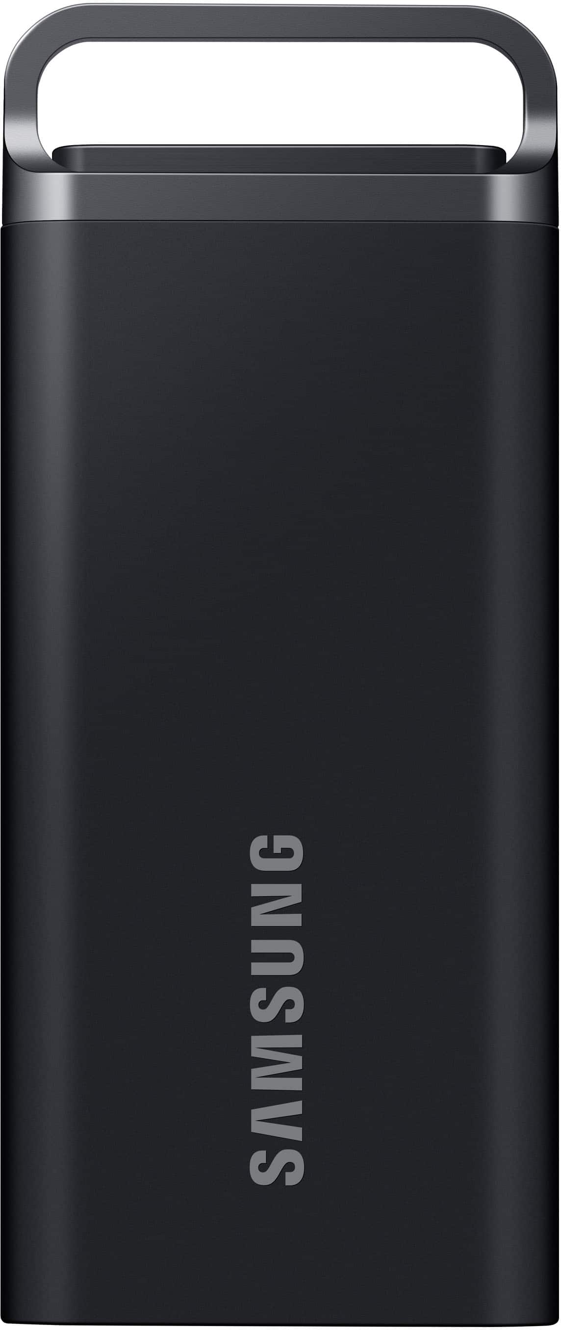 Samsung T7 Shield Portable SSD in rugged blue design on a outdoor surface